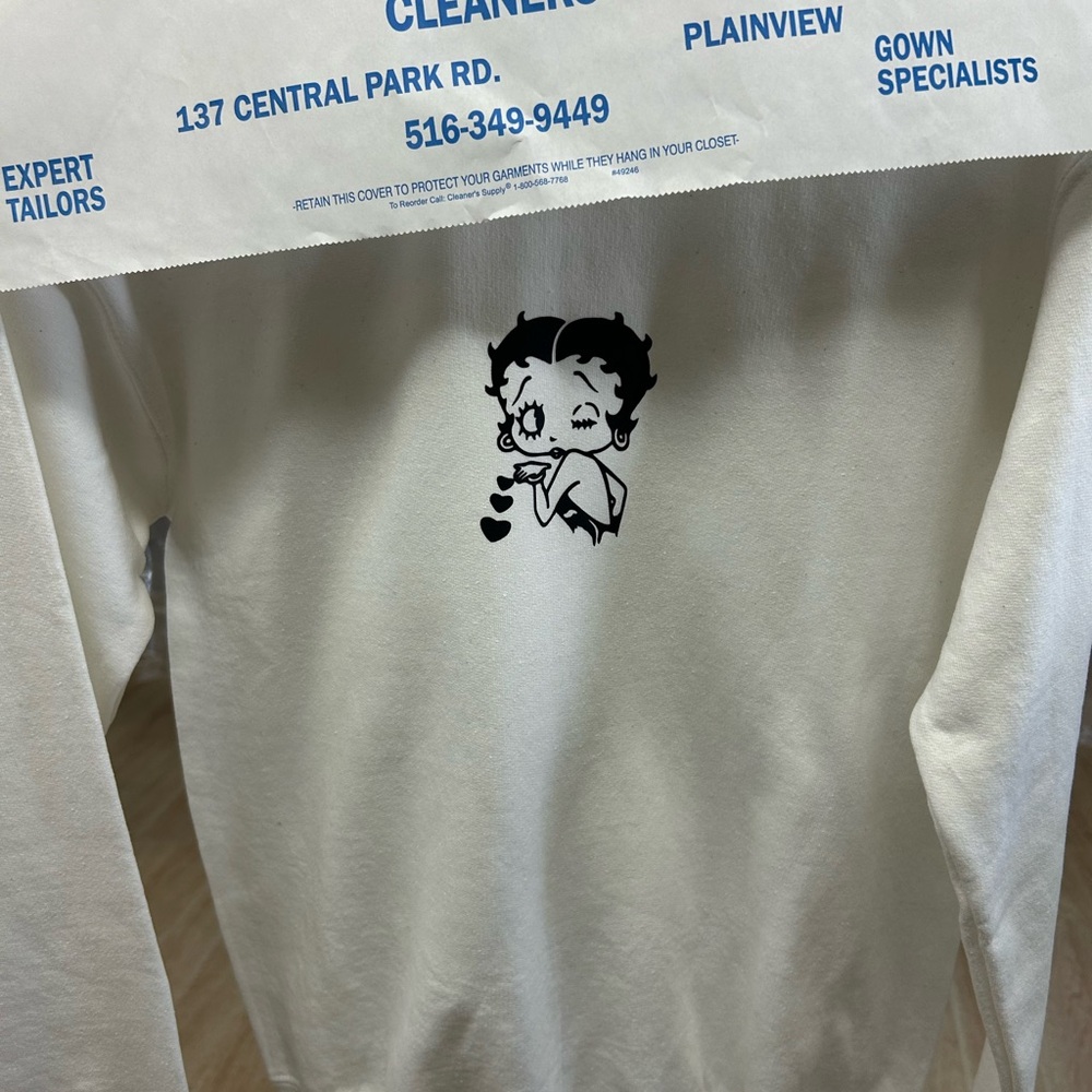 White Sweatshirt with Cartoon Graphic